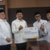 Penyerahan Zakat Mal Warnai Peringatan Nuzulul Quran di Sumedang